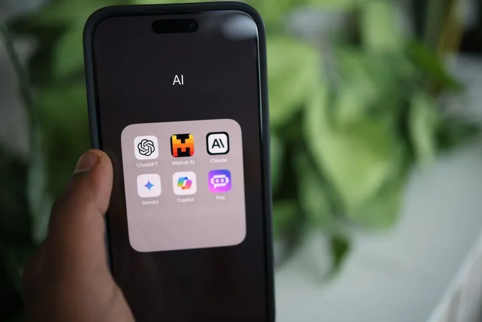 Person looking at multiple new AI tool icons on a screen